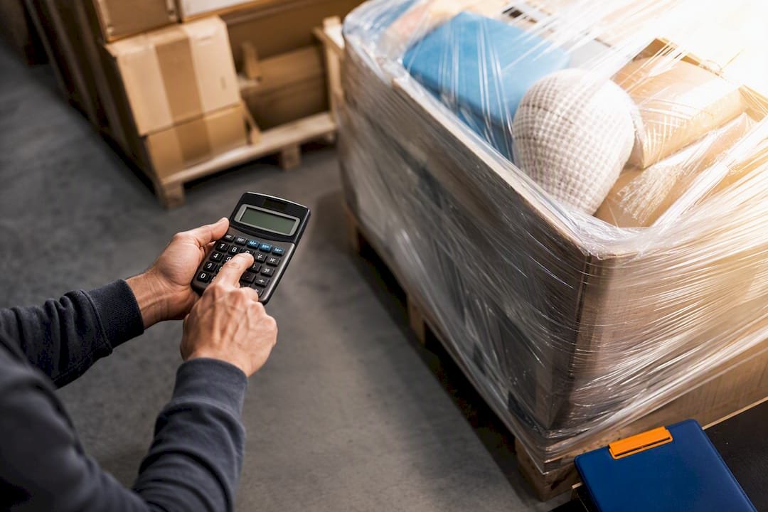 Reseller calculating pallet profit margin