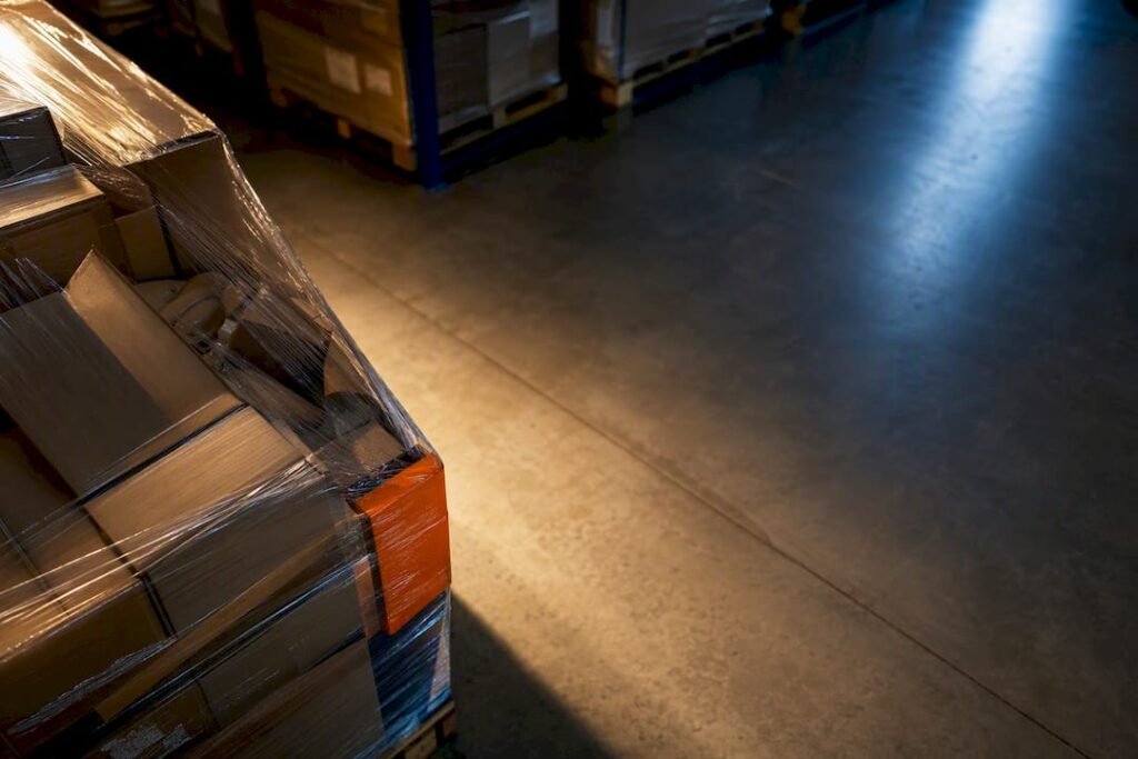 Anonymous liquidation pallet staged for freight