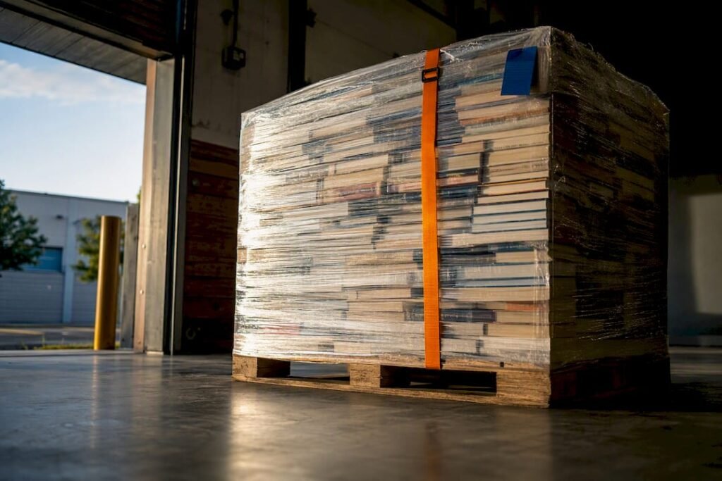 Shrink-wrapped mixed book pallet in receiving bay